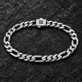 Flat alternating curb and elongated link bracelet on a charcoal background
