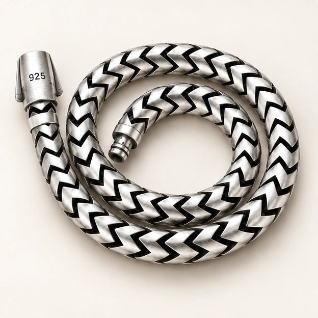 925 sterling silver chevron-link bracelet on an ivory background