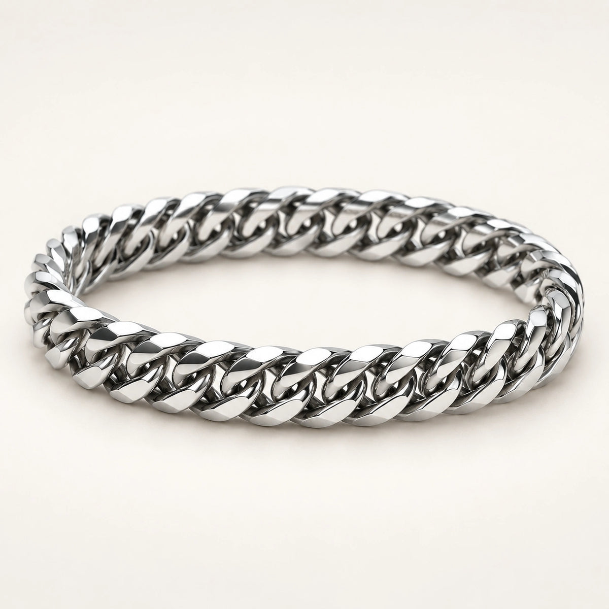 Polished curb-link bracelet on an ivory cushion